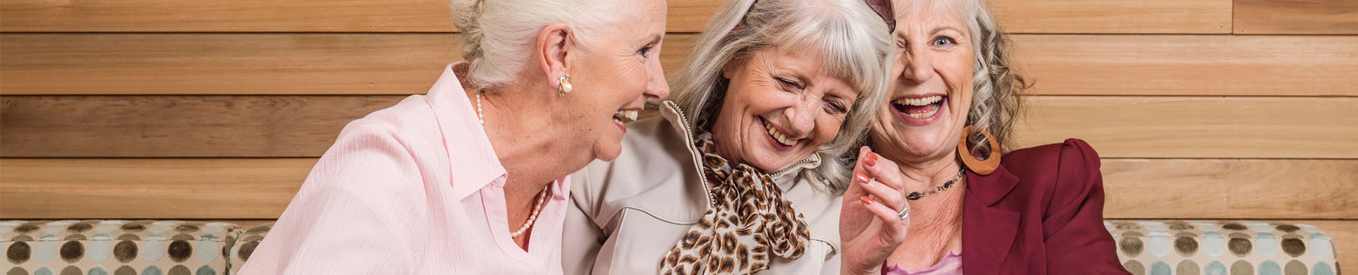 A group of female residents laughing together 