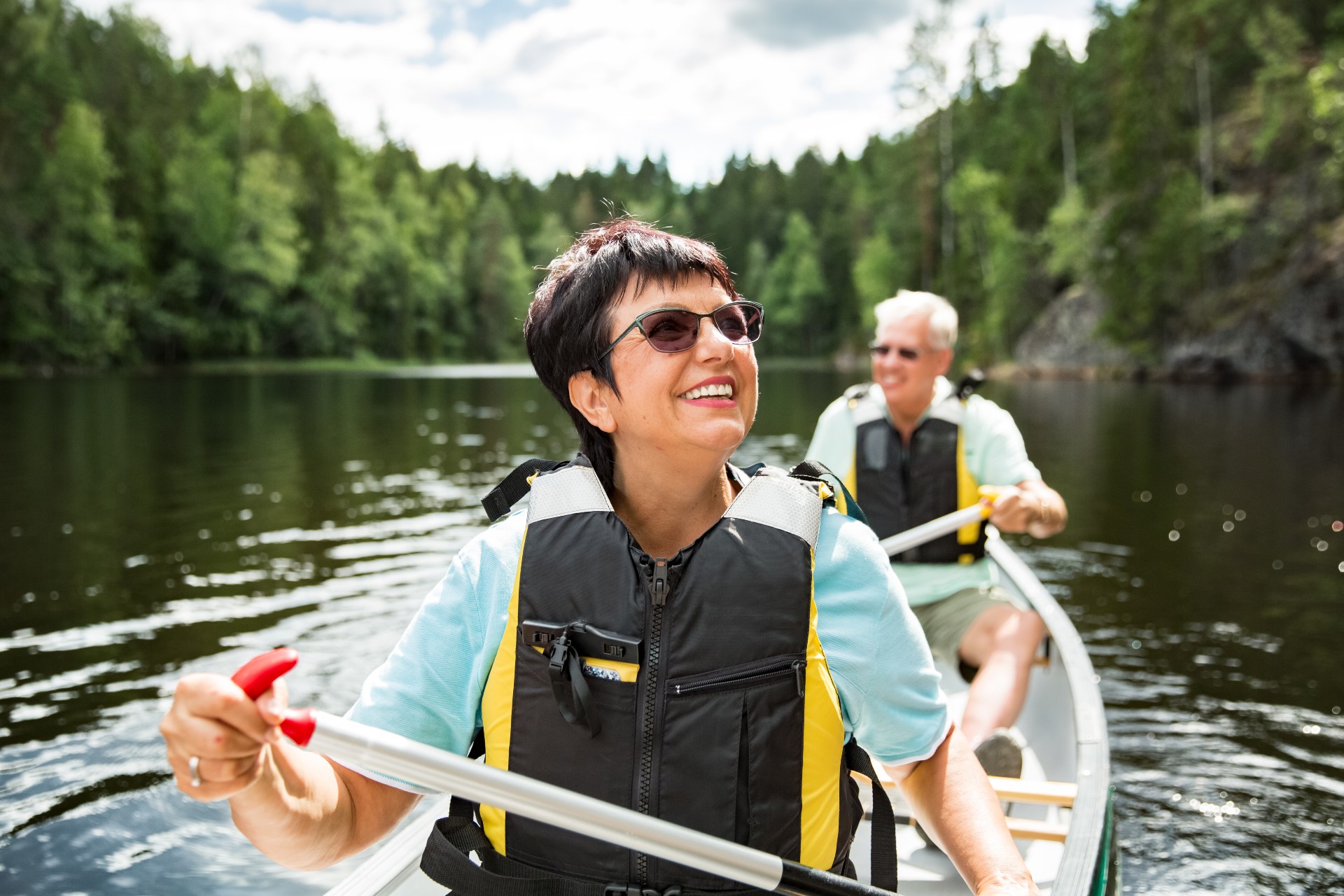 Happy senior couple on a kayak