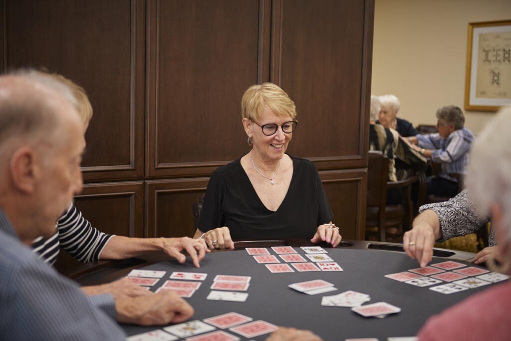 Senior residents playing card games.