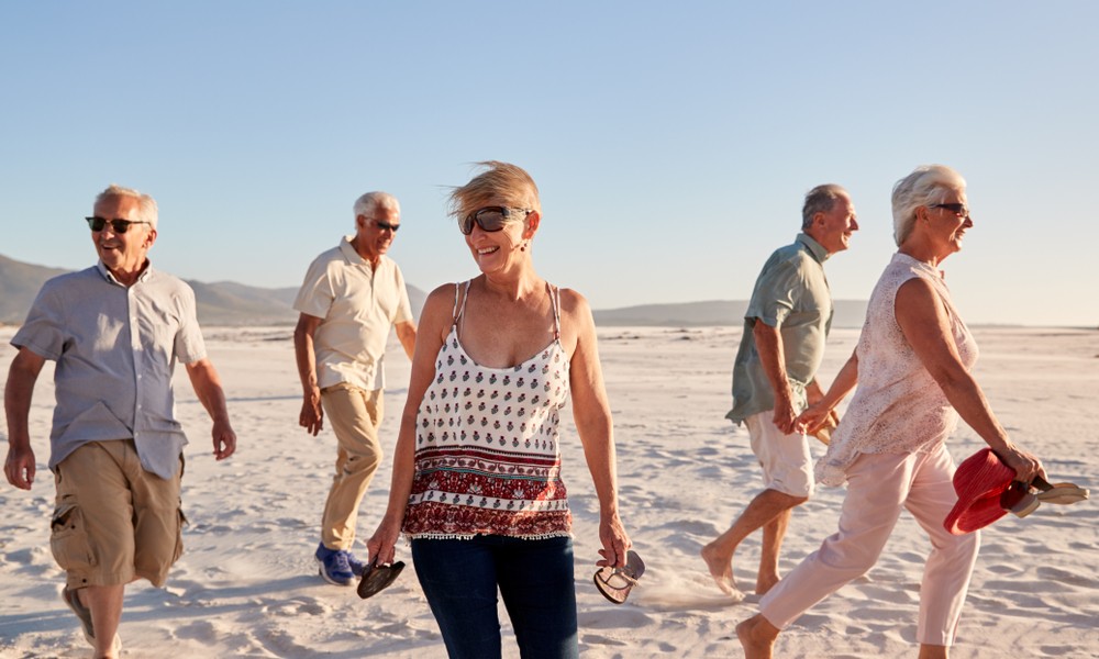 Senior friends enjoying the beach