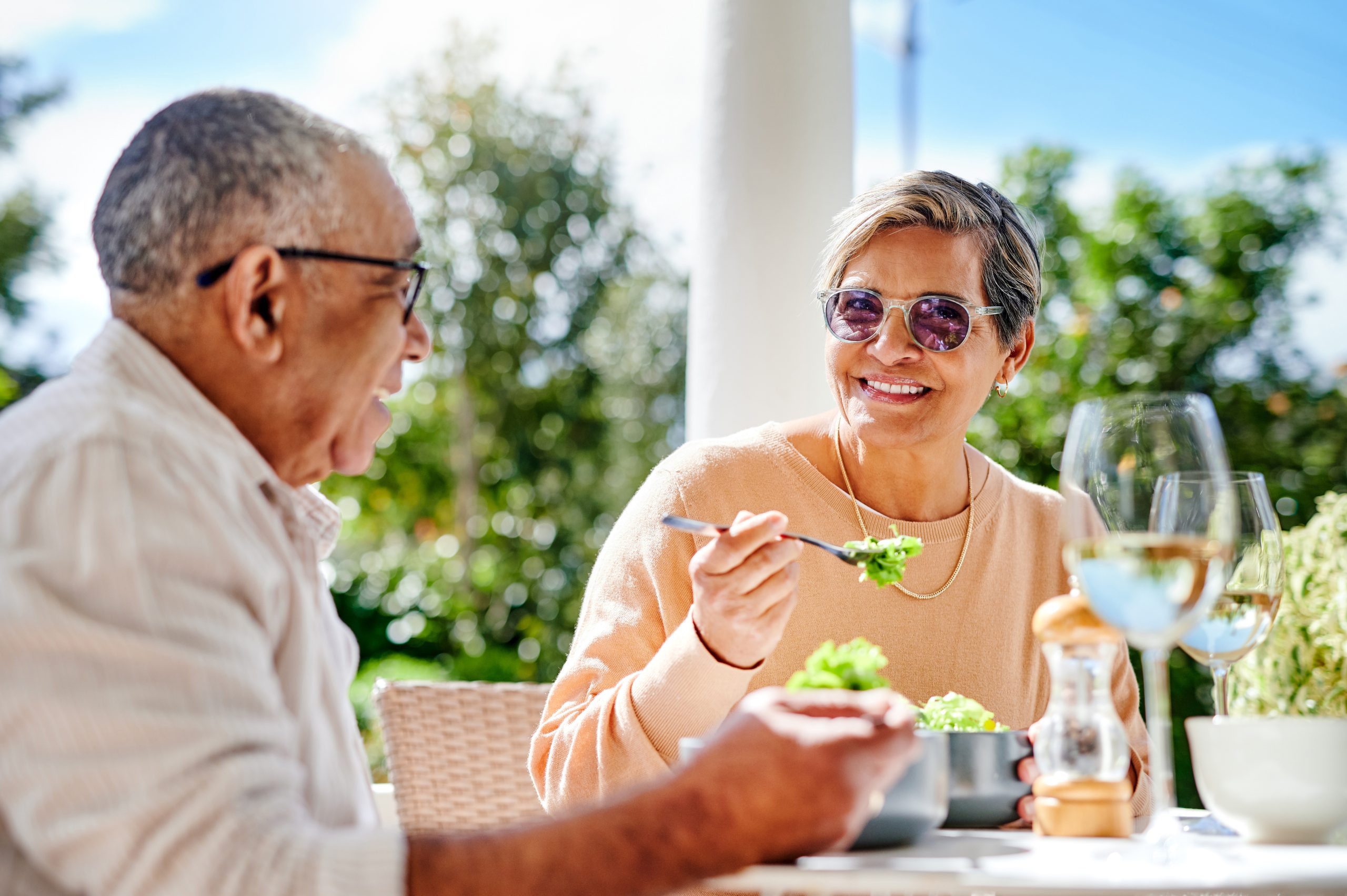 Senior couple enjoying a meal outside